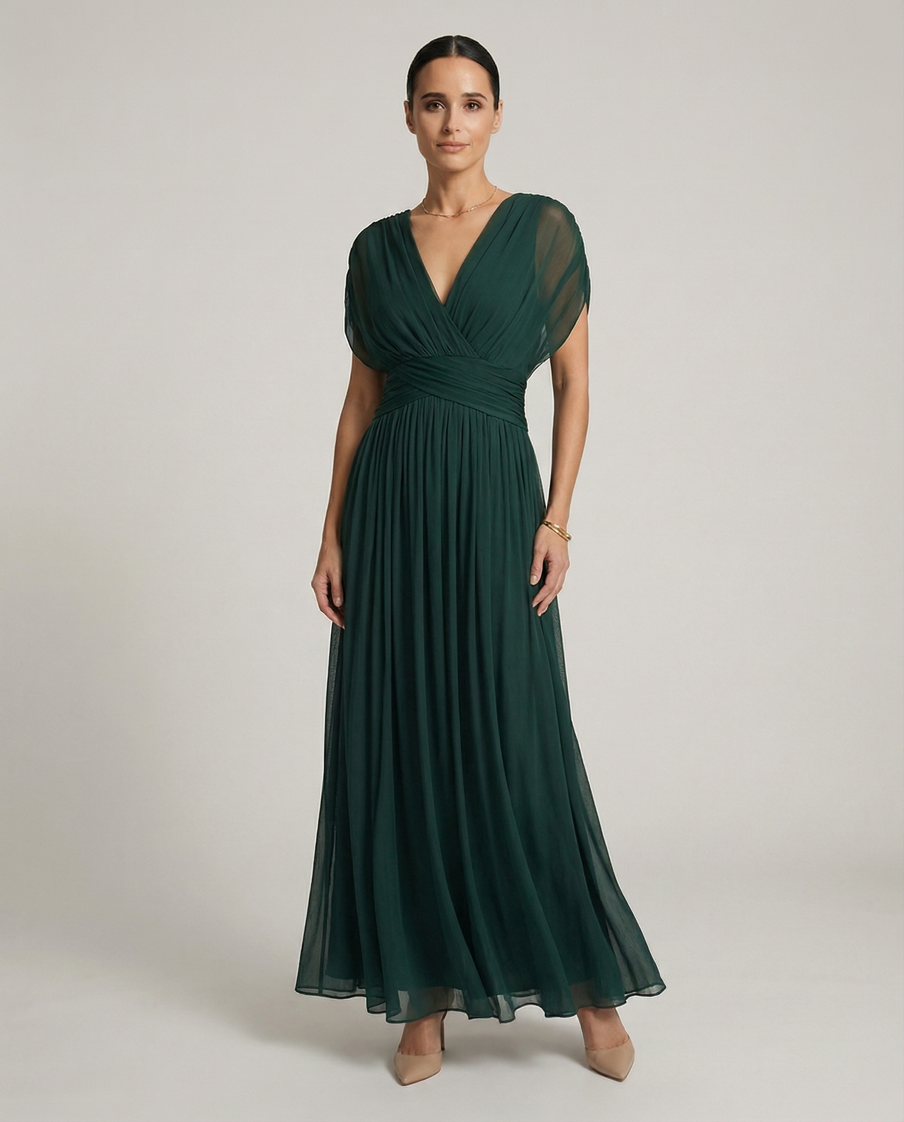 Women’s pleated V-neck maxi dress with flowing skirt and soft gradient tones