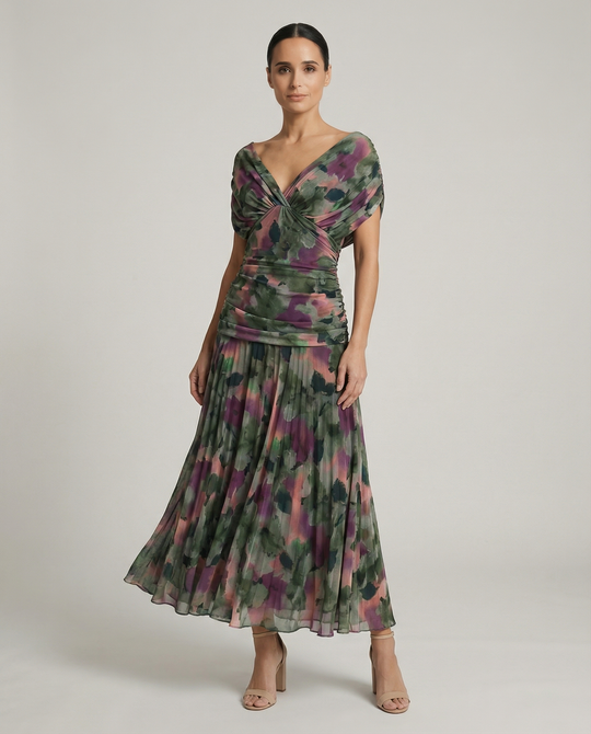Women’s pleated V-neck maxi dress with flowing skirt and soft gradient tones