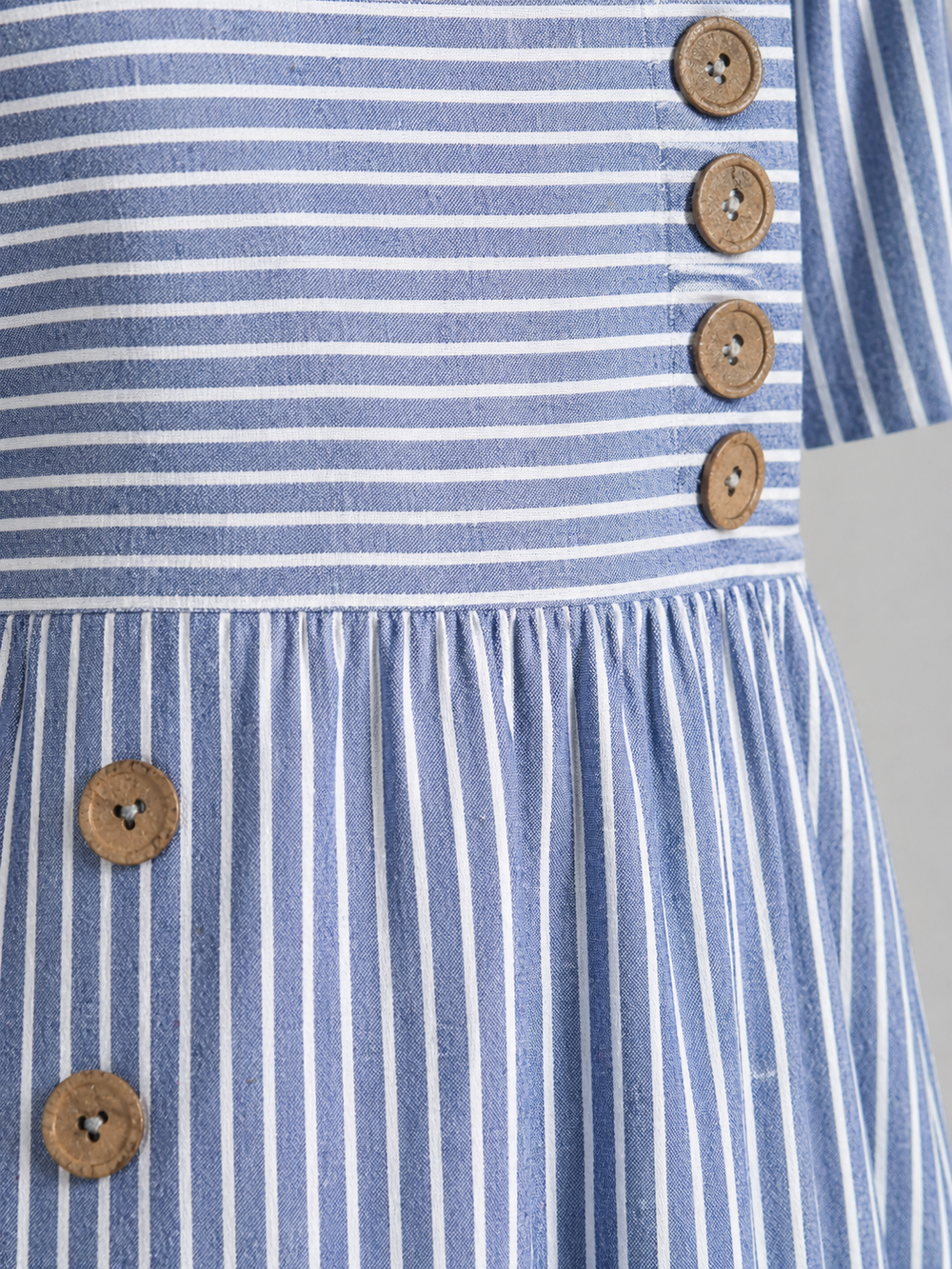 Women’s striped midi dress with relaxed A-line fit and side pockets