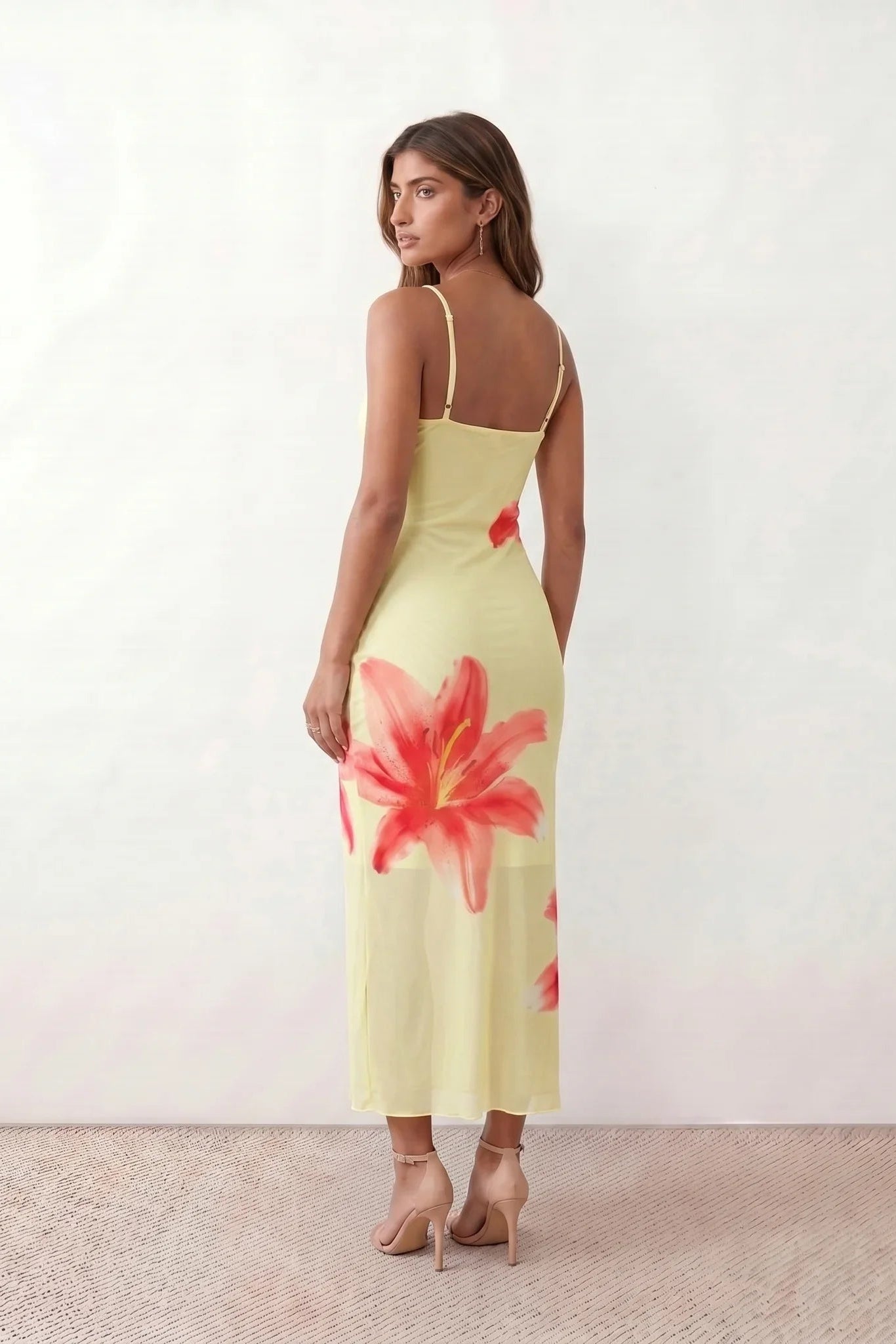 Women's floral slip maxi dress with a square neckline, delicate spaghetti straps, and a body-skimming silhouette featuring an all-over floral print on a sheer mesh overlay, ideal for weddings, summer occasions, and elegant evening wear.