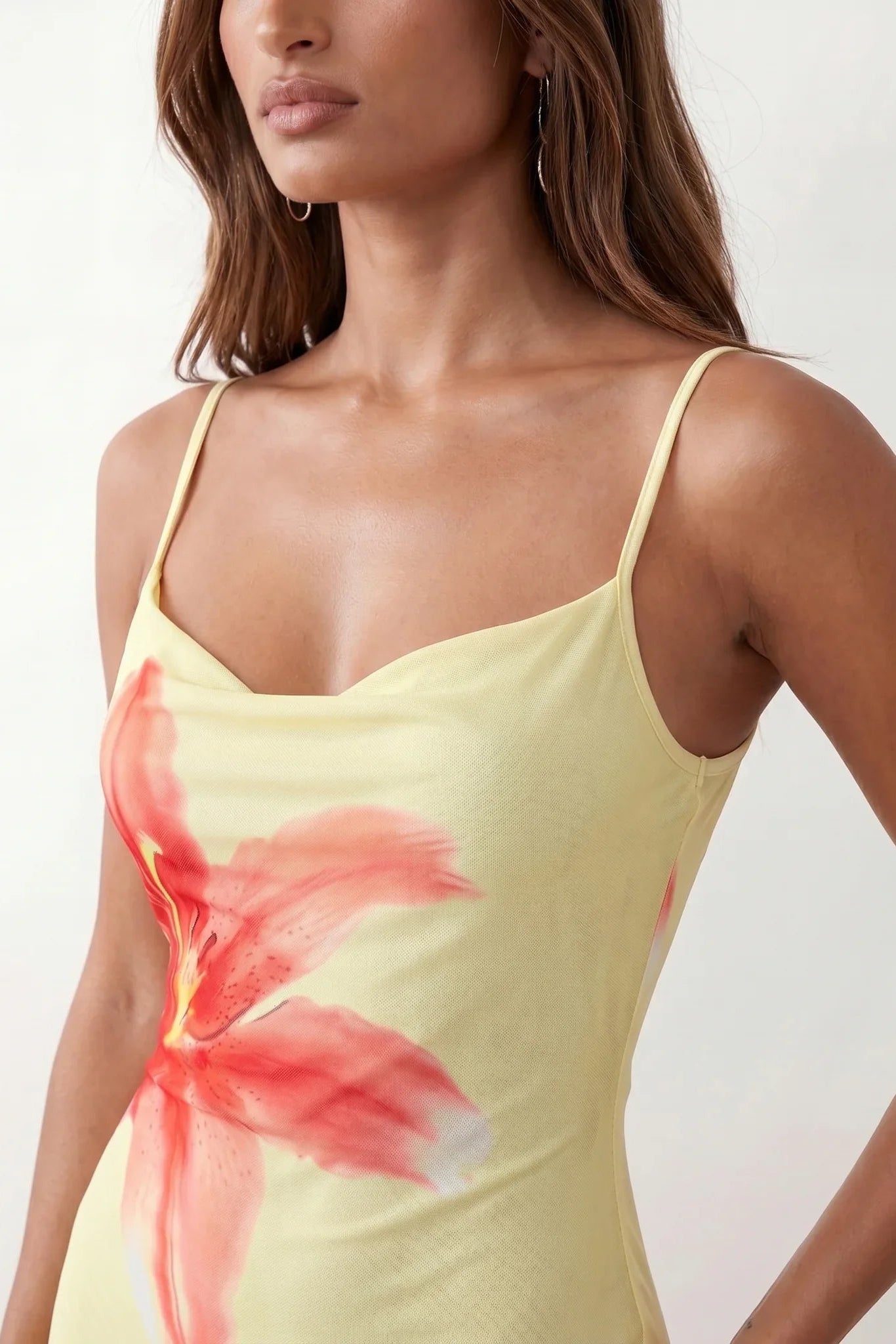 Women's floral slip maxi dress with a square neckline, delicate spaghetti straps, and a body-skimming silhouette featuring an all-over floral print on a sheer mesh overlay, ideal for weddings, summer occasions, and elegant evening wear.