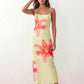 Women's floral slip maxi dress with a square neckline, delicate spaghetti straps, and a body-skimming silhouette featuring an all-over floral print on a sheer mesh overlay, ideal for weddings, summer occasions, and elegant evening wear.