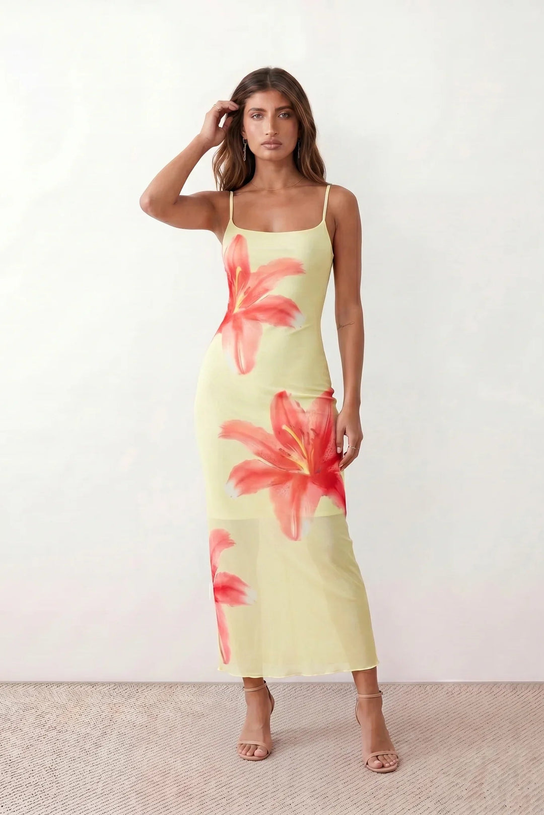 Women's floral slip maxi dress with a square neckline, delicate spaghetti straps, and a body-skimming silhouette featuring an all-over floral print on a sheer mesh overlay, ideal for weddings, summer occasions, and elegant evening wear.