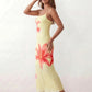 Women's floral slip maxi dress with a square neckline, delicate spaghetti straps, and a body-skimming silhouette featuring an all-over floral print on a sheer mesh overlay, ideal for weddings, summer occasions, and elegant evening wear.