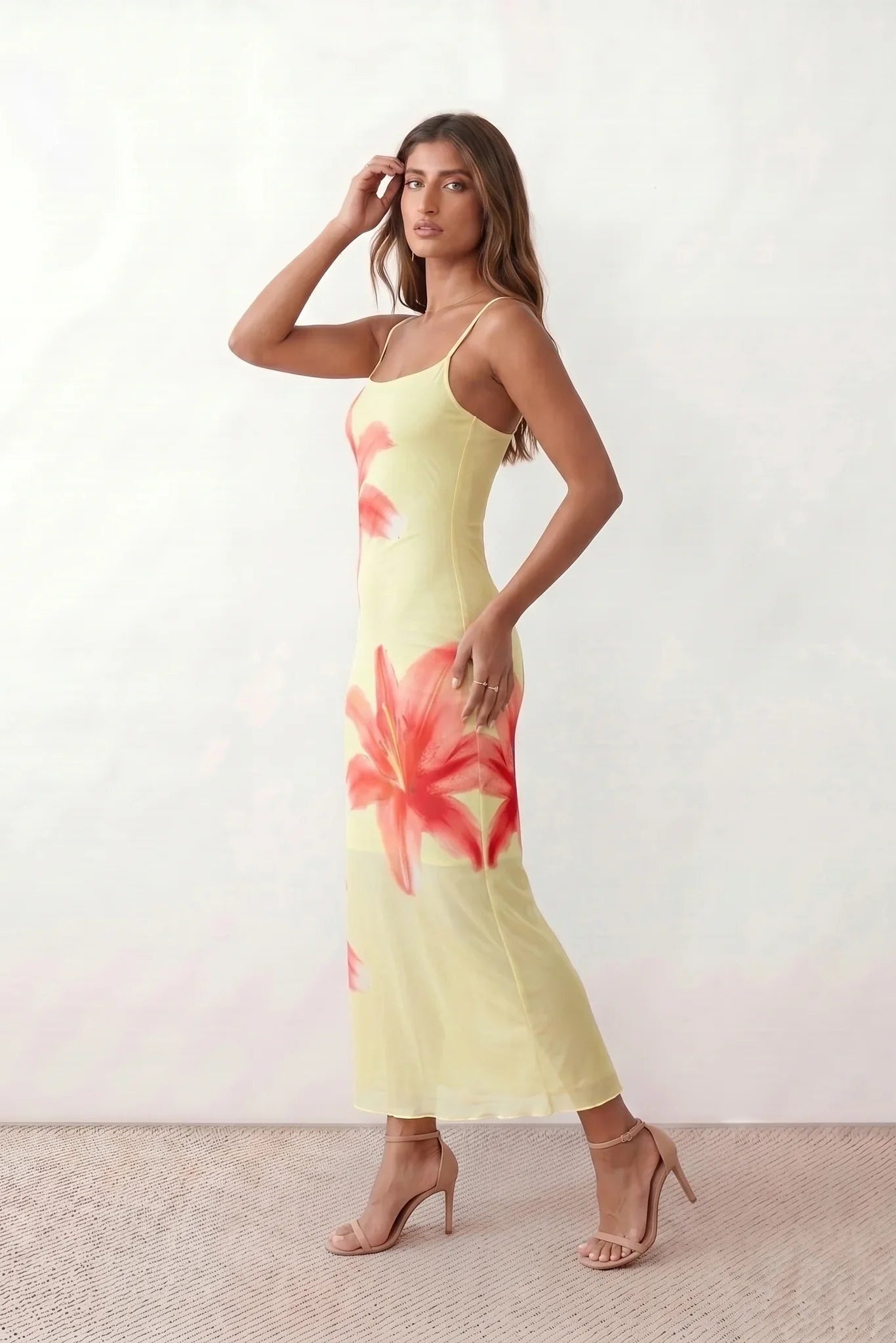 Women's floral slip maxi dress with a square neckline, delicate spaghetti straps, and a body-skimming silhouette featuring an all-over floral print on a sheer mesh overlay, ideal for weddings, summer occasions, and elegant evening wear.